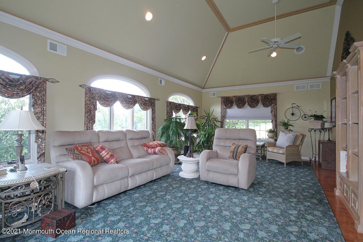 33 Maher Road Freehold, NJ 07728 - Photo 6 of 46 a living room with furniture and a large window