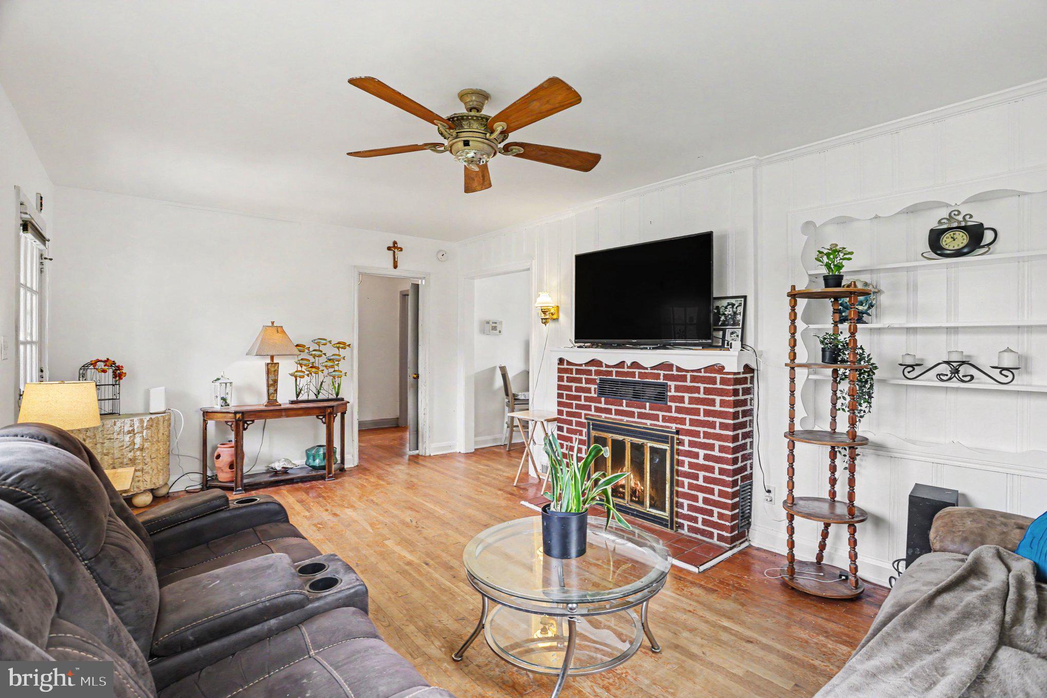 5912 Shady Spring Avenue Baltimore, MD 21237 - Photo 30 of 75 Cozy living space with classic charm.
