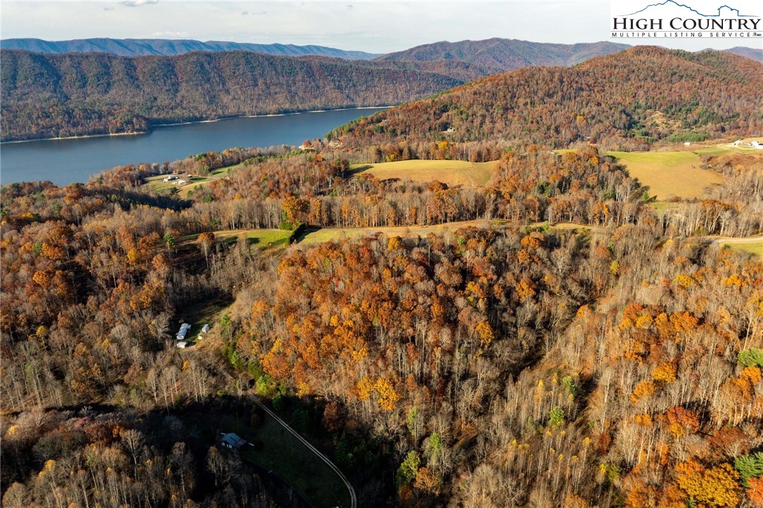 Lot 51 Redbud Circle Butler, TN 37640 - Photo 13 of 31 a view of a lake with a mountain in the background