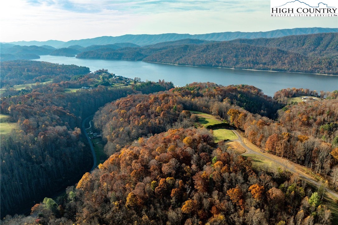 Lot 51 Redbud Circle Butler, TN 37640 - Photo 15 of 31 a view of a lake with mountains in the background