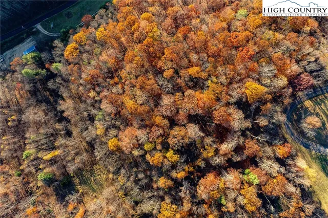 a view of a city with mountains in the background