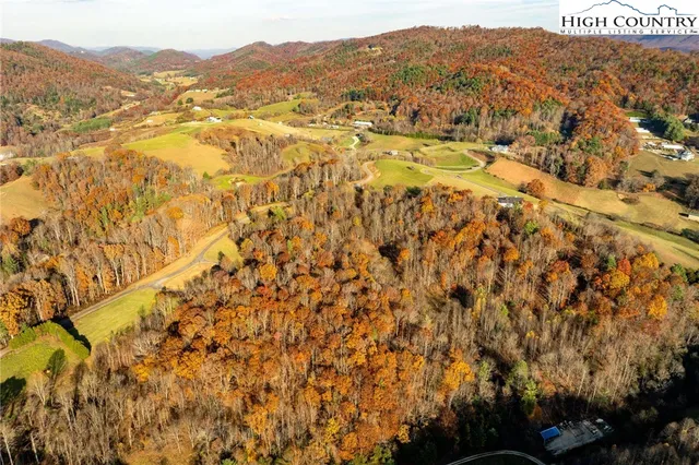 a view of a lake with mountains in the background