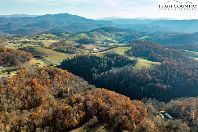a view of a backyard with a lake