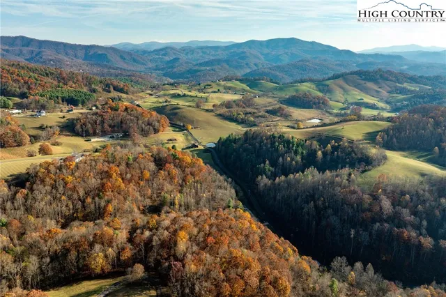 a view of mountains and valleys
