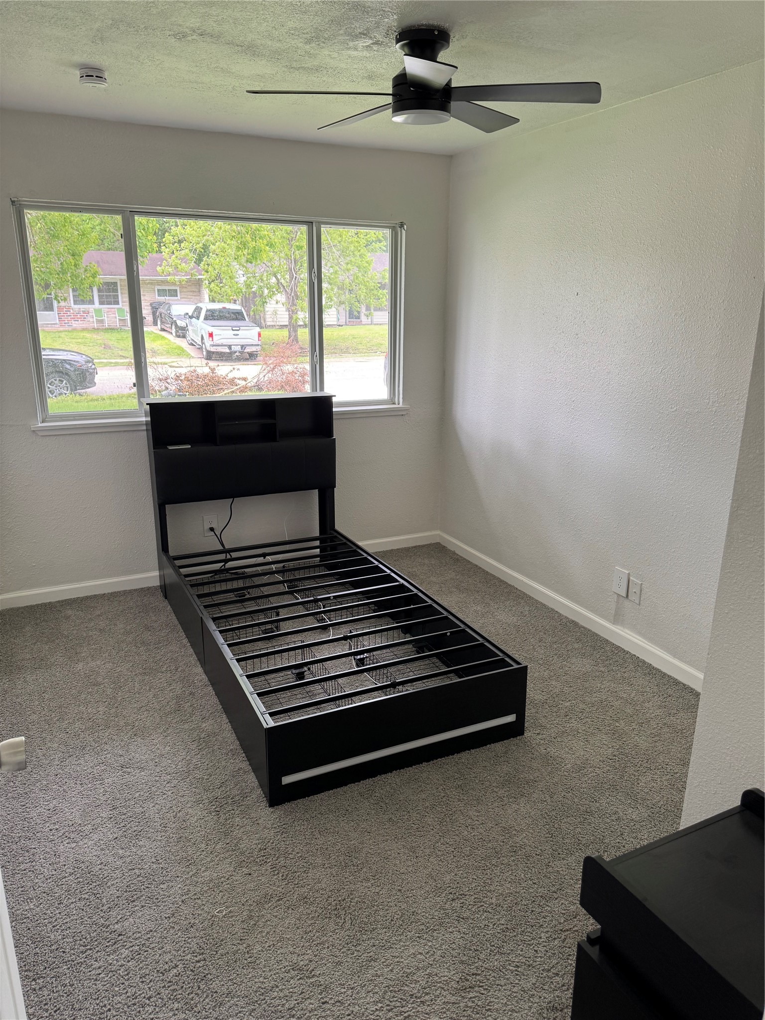 4215 Botany Lane Houston, TX 77047 - Photo 15 of 23 a room with wooden floor and window