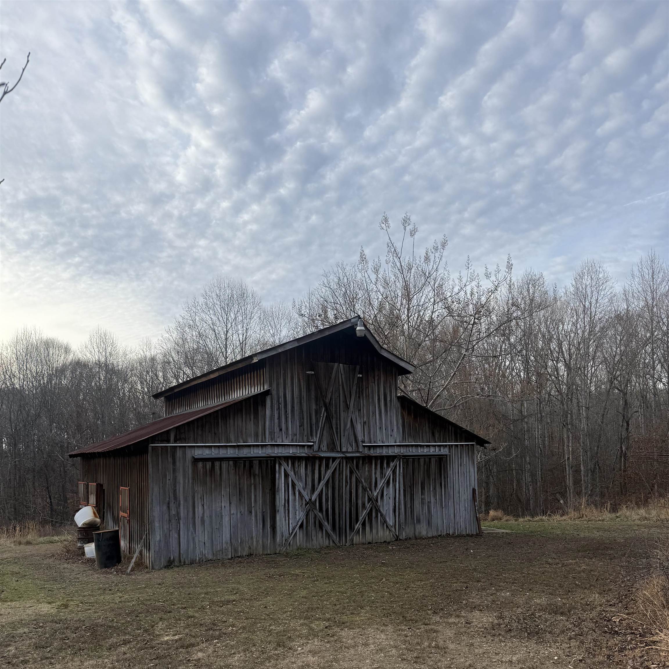 1595 Kelly Road Holladay, TN 38341 - Photo 14 of 15 a wooden door in front of a house