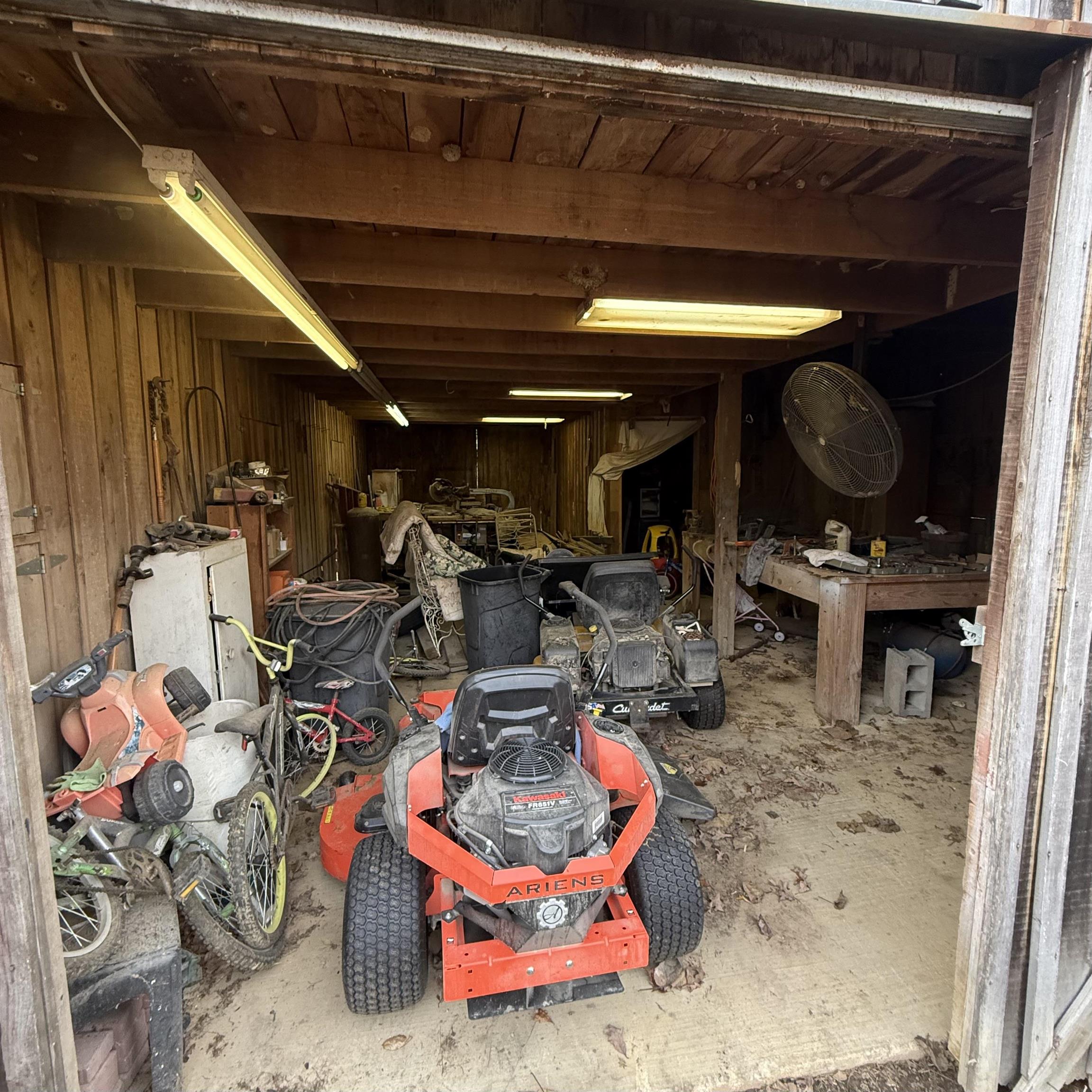 1595 Kelly Road Holladay, TN 38341 - Photo 15 of 15 a view of a storage room with a lot of stuff