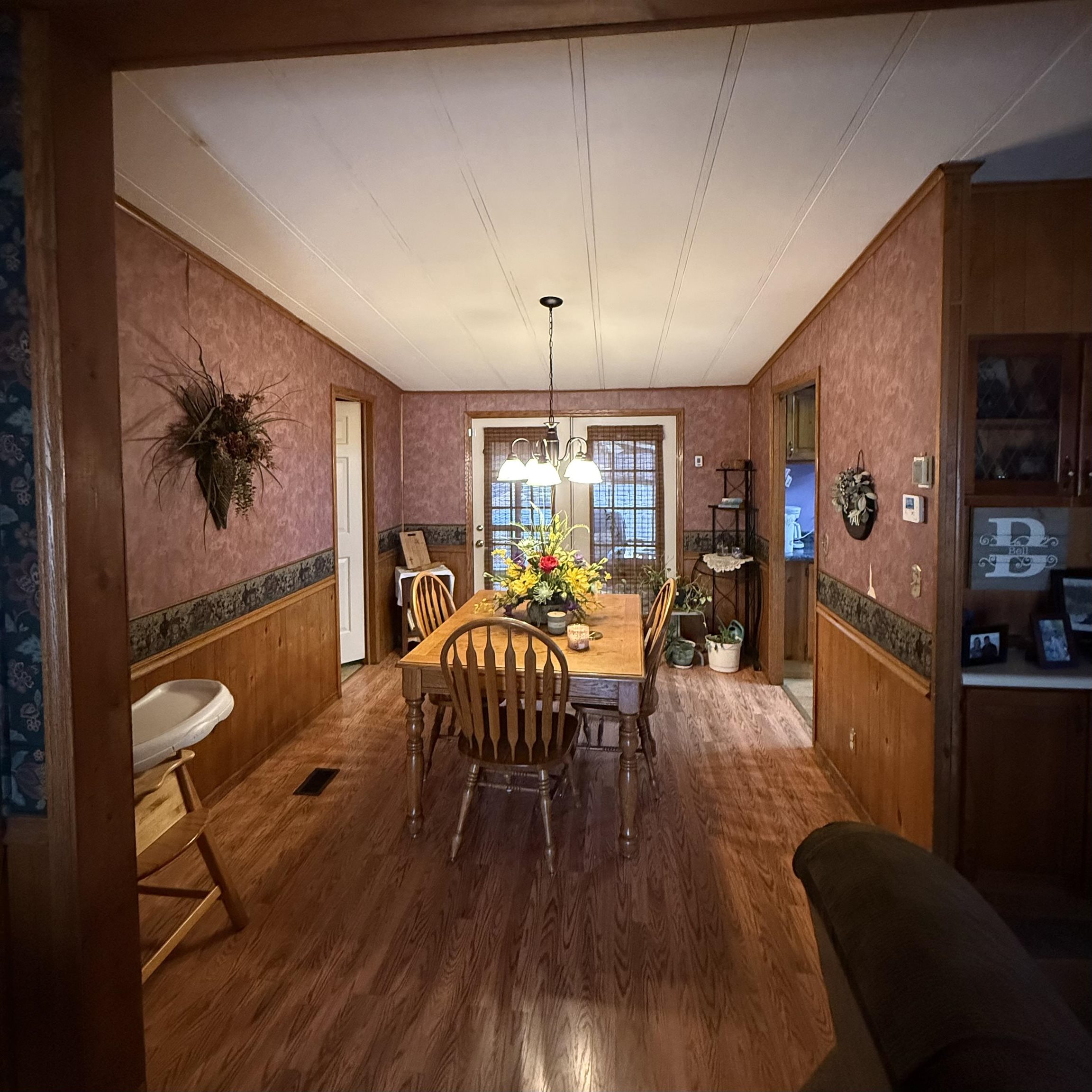 1595 Kelly Road Holladay, TN 38341 - Photo 4 of 15 a view of a dining room with furniture window and wooden floor