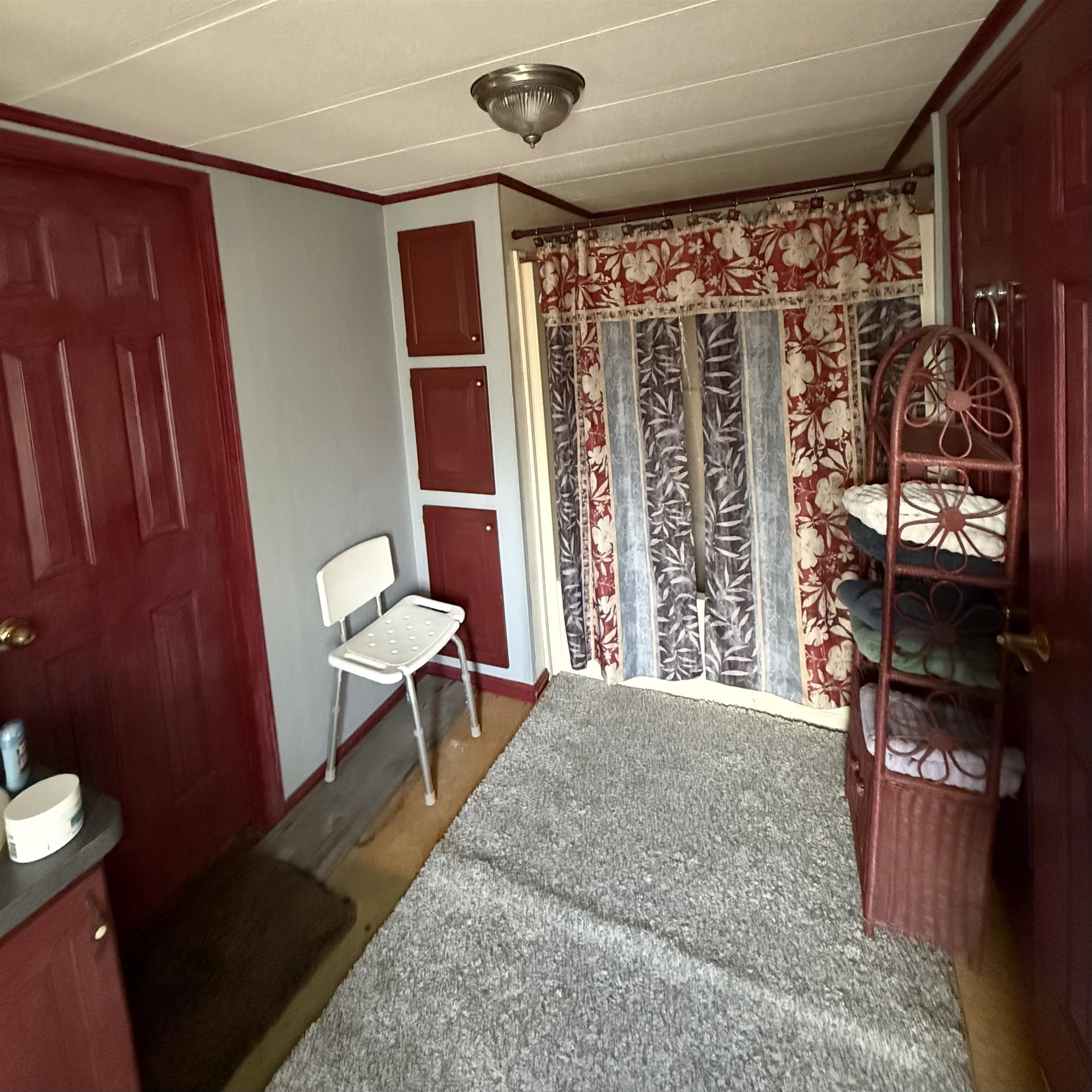 1595 Kelly Road Holladay, TN 38341 - Photo 7 of 15 a view of a room with shelves and furniture