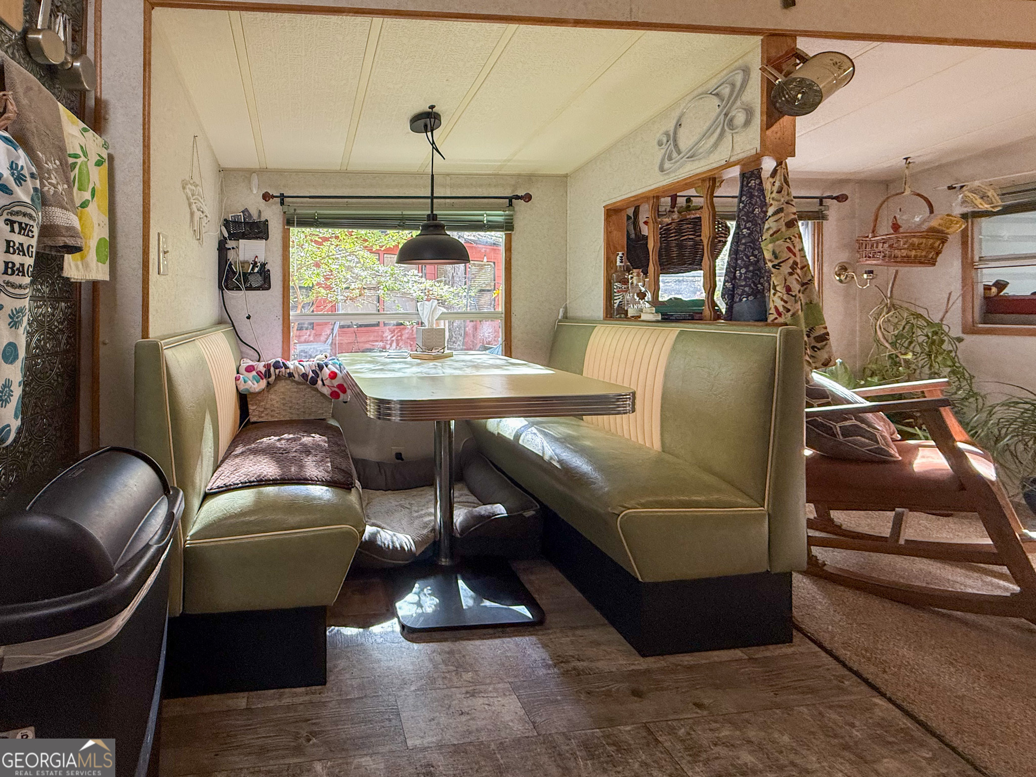 61 Rocky Lane Cleveland, GA 30528 - Photo 12 of 20 a living room with furniture and a large window