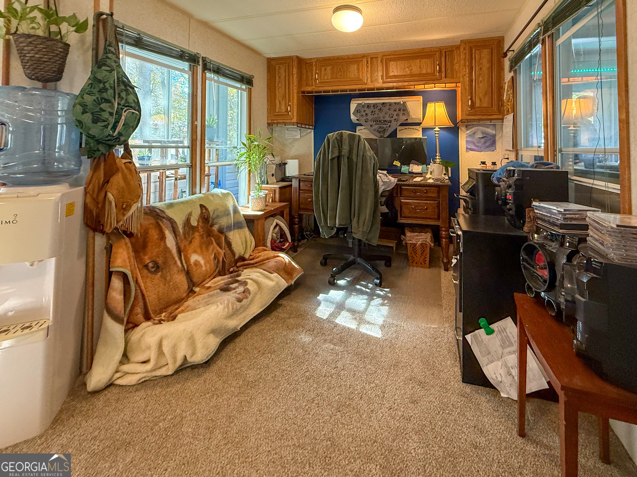 61 Rocky Lane Cleveland, GA 30528 - Photo 13 of 20 a living room with furniture fireplace and a large window