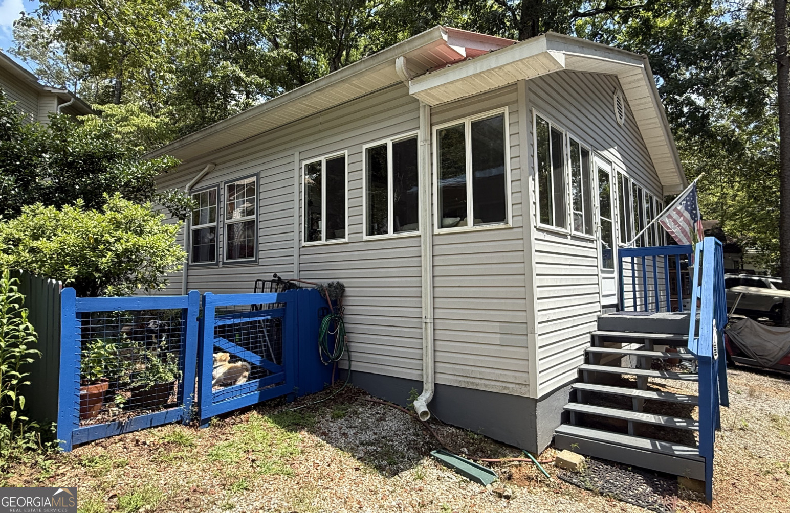 61 Rocky Lane Cleveland, GA 30528 - Photo 2 of 20 a front view of a house with balcony