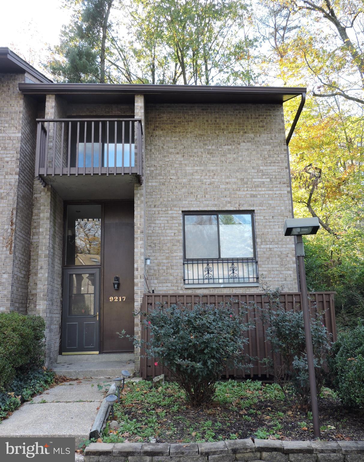 Welcome to this spacious end-unit three-story home