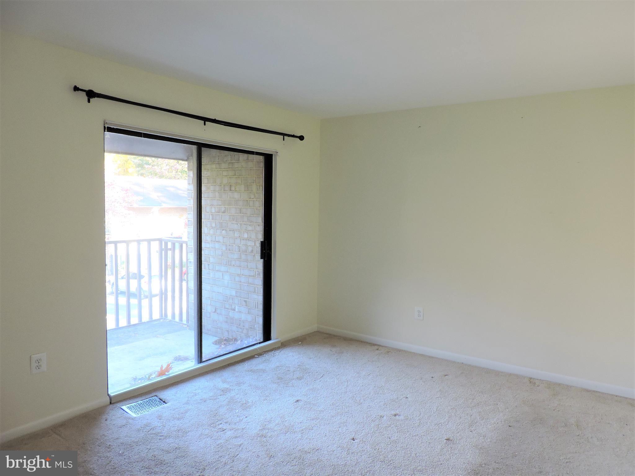 9217 Three Oaks Drive Silver Spring, MD 20901 - Photo 14 of 24 Master bedroom suite with balcony