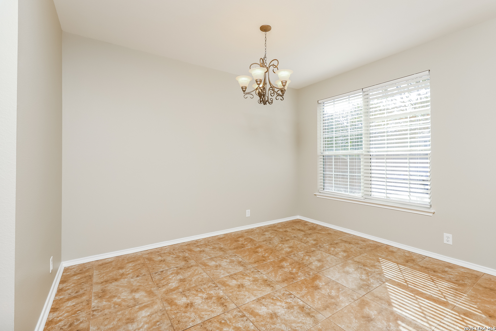 8611 Tioga Pass Helotes, TX 78023 - Photo 10 of 14 a view of an empty room with a window