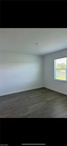 a view of small space with wooden floor