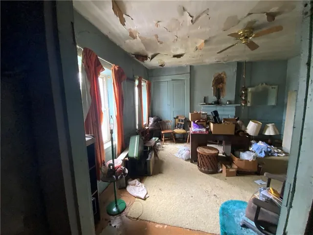 a room with gym equipment and a large window