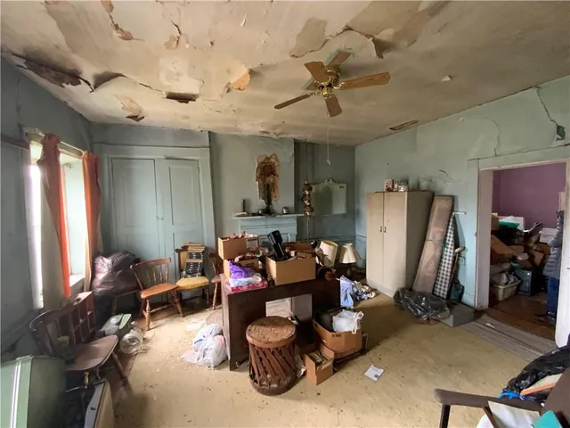 a bed room with a bed and a car