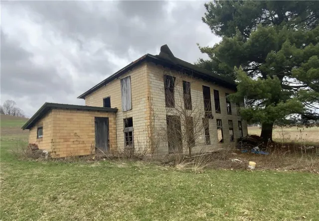 a view of a garden with a fountain