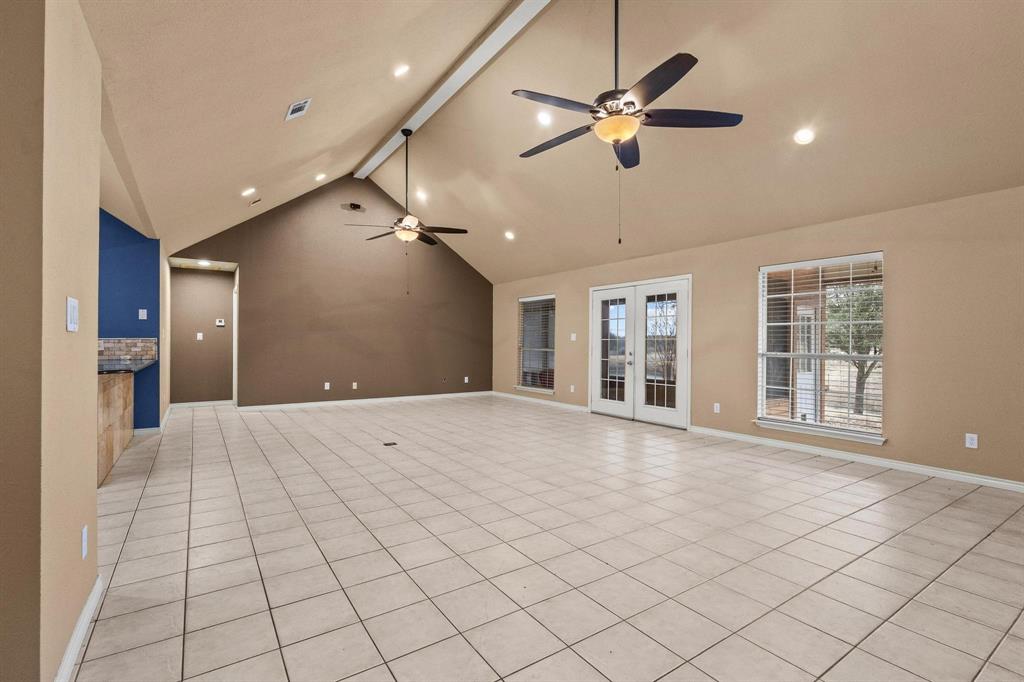 265 Cooks Corner Road Pottsboro, TX 75076 - Photo 12 of 40 a view of an empty room with a window