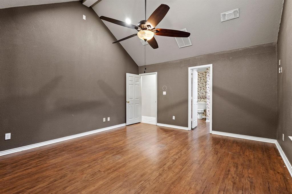265 Cooks Corner Road Pottsboro, TX 75076 - Photo 13 of 40 wooden floor in an empty room with a window