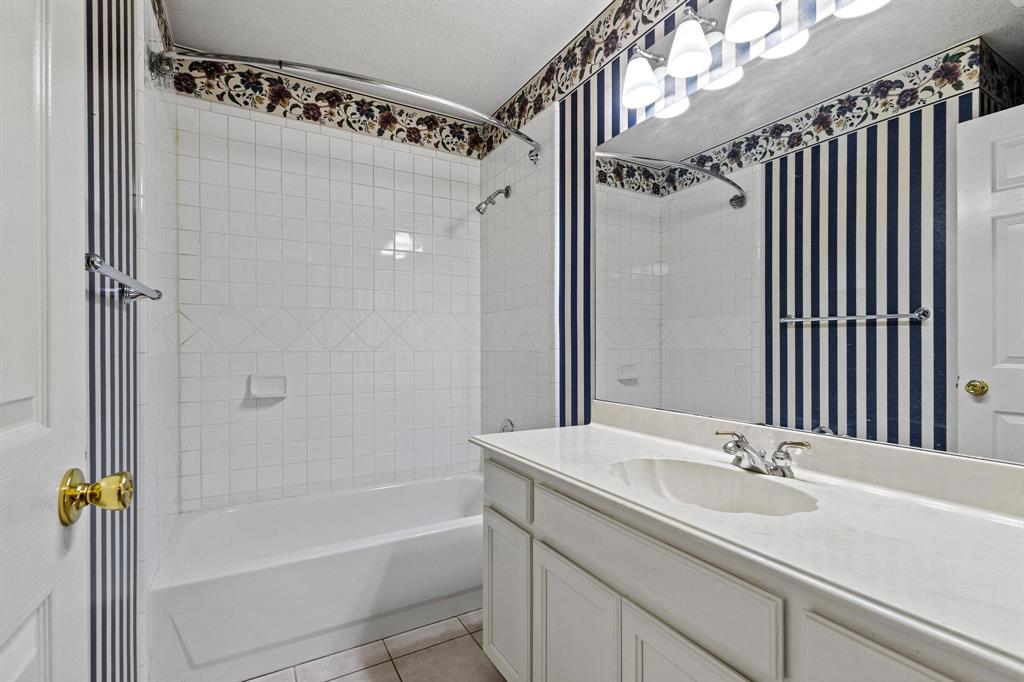 265 Cooks Corner Road Pottsboro, TX 75076 - Photo 19 of 40 a bathroom with a shower and a sink
