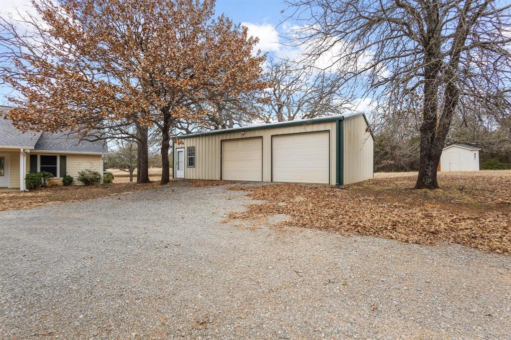265 Cooks Corner Road Pottsboro, TX 75076 - Photo 23 of 40 a house with a outdoor space