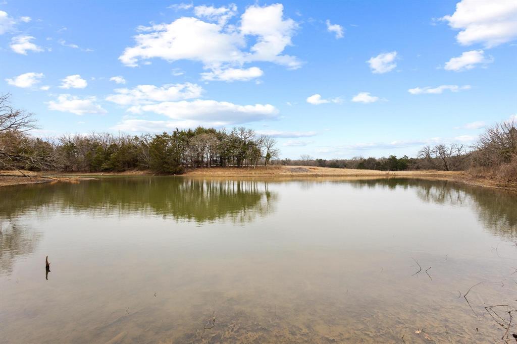 265 Cooks Corner Road Pottsboro, TX 75076 - Photo 34 of 40 a view of a lake with houses