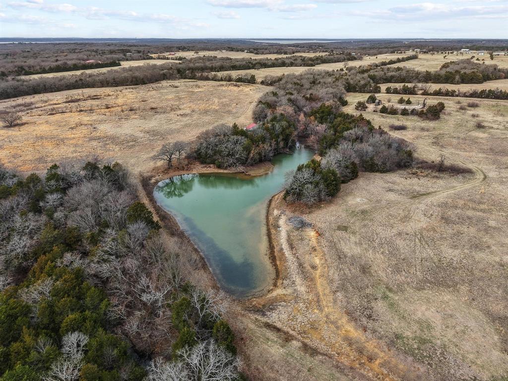 265 Cooks Corner Road Pottsboro, TX 75076 - Photo 35 of 40 a view of a lake with a mountain