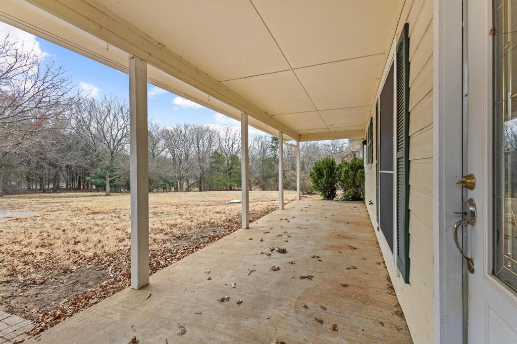 265 Cooks Corner Road Pottsboro, TX 75076 - Photo 8 of 40 a view of a porch