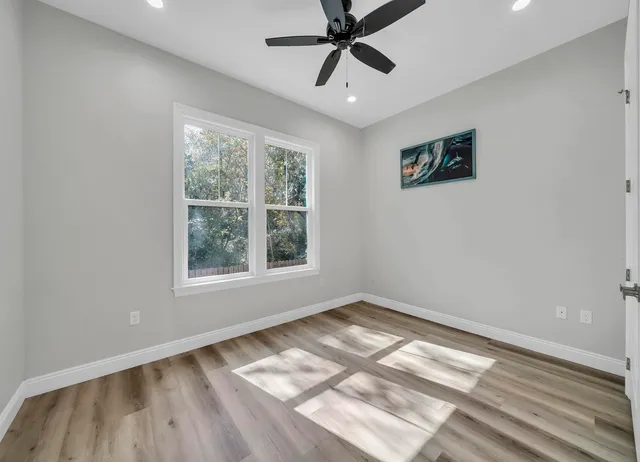 a view of an empty room and window