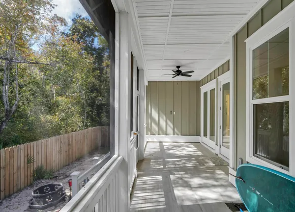 a view of a porch with wooden floor and outdoor space