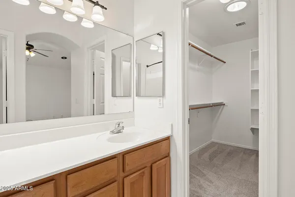 a view of an empty walk in closet