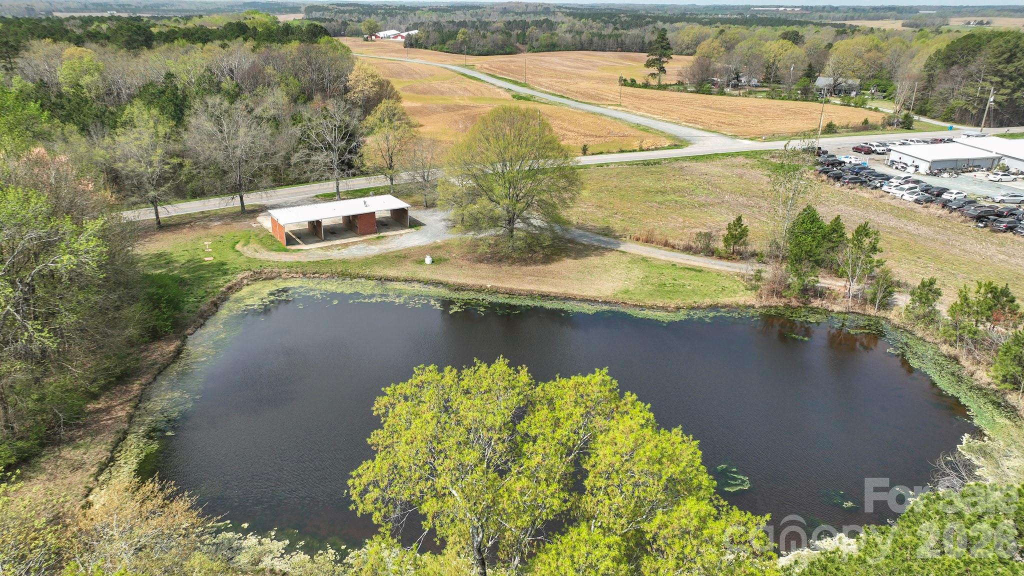 7301 Wolf Pond Road Monroe, NC 28112 - Photo 12 of 14 a view of a lake