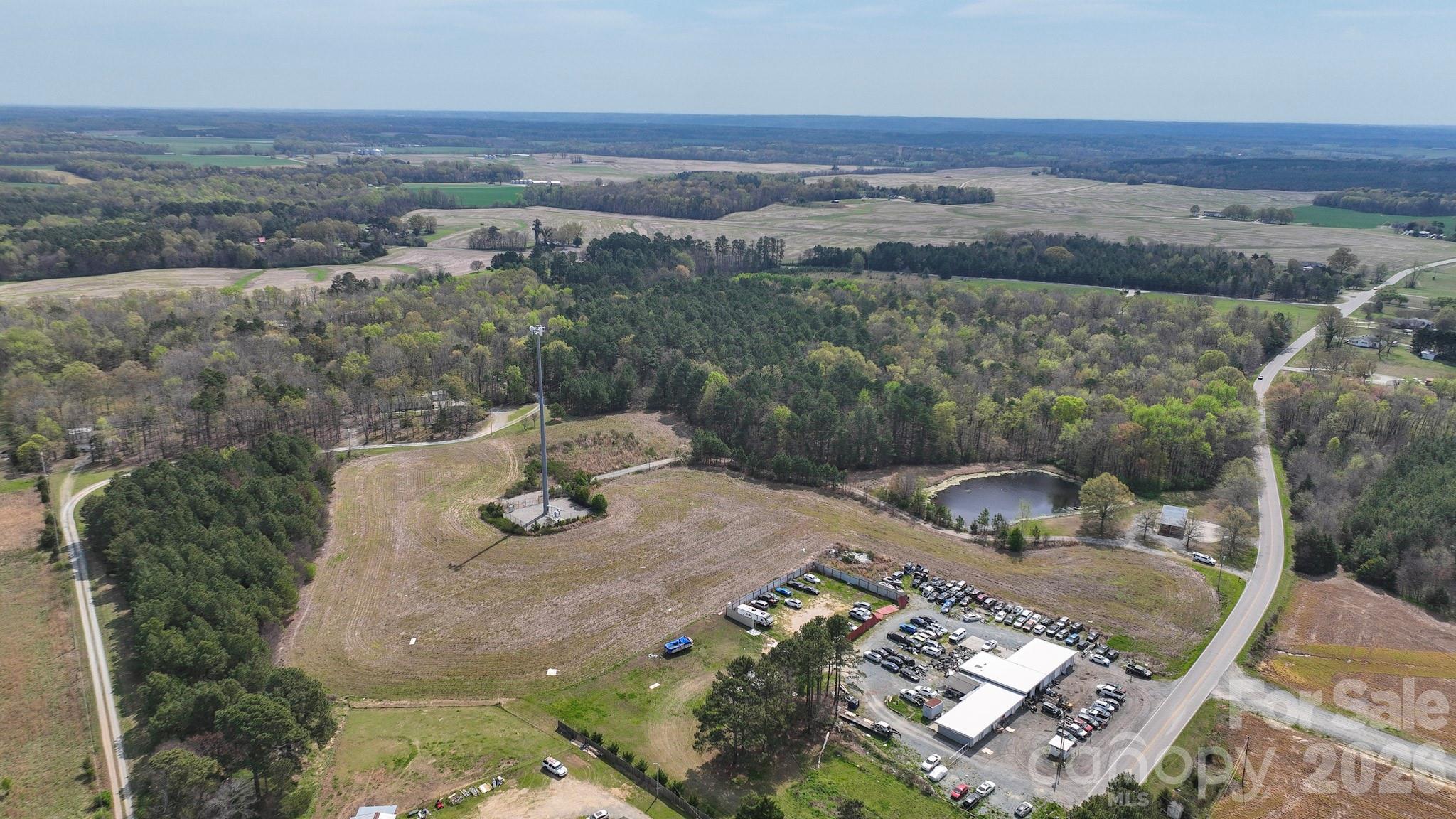 7301 Wolf Pond Road Monroe, NC 28112 - Photo 7 of 14 an aerial view of a house with yard