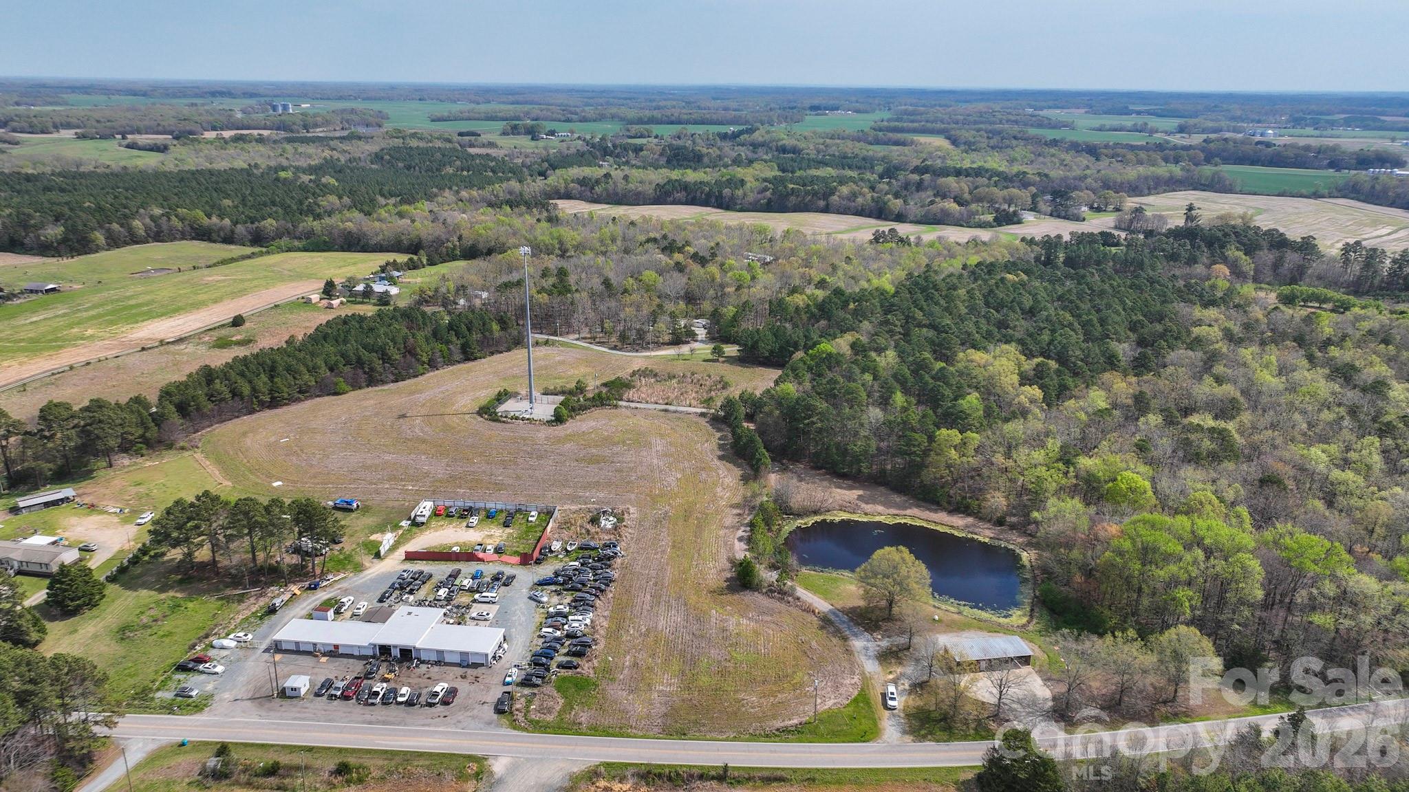 7301 Wolf Pond Road Monroe, NC 28112 - Photo 8 of 14 an aerial view of a house with outdoor space
