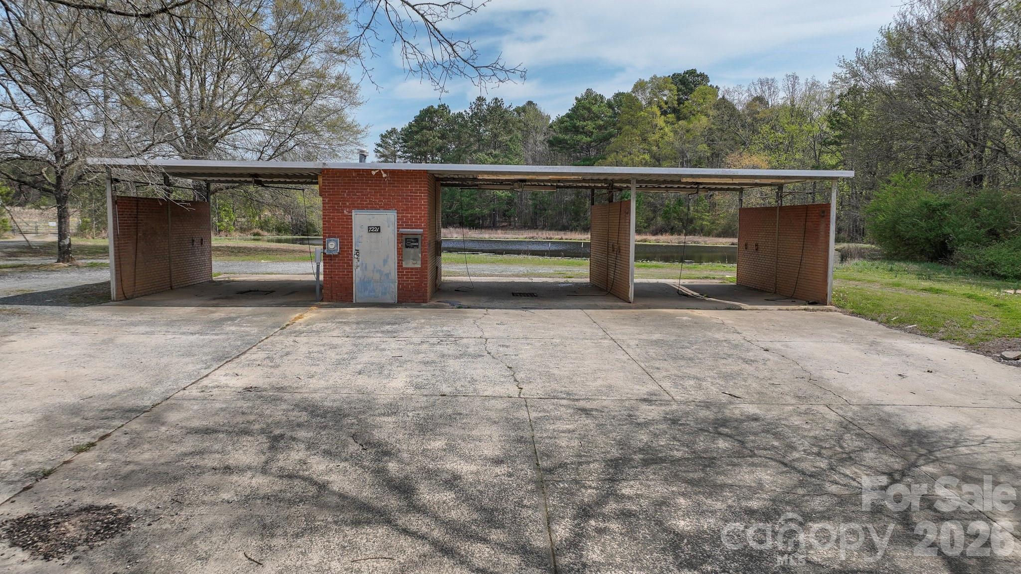 7301 Wolf Pond Road Monroe, NC 28112 - Photo 9 of 14 a view of backyard with mountain and trees