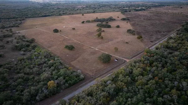 a view of a backyard of a house