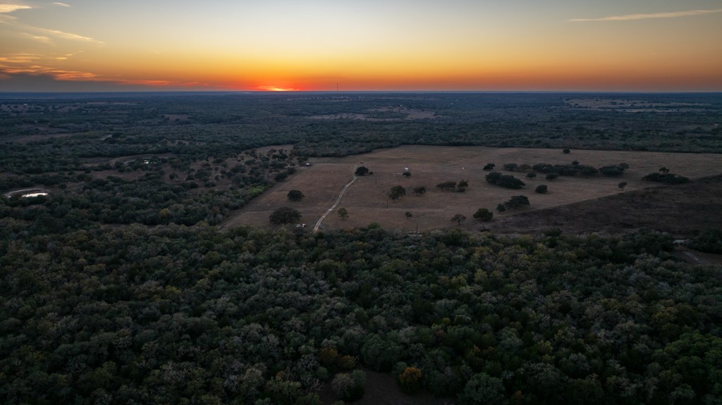 1038 Old Goliad Road Goliad, TX 77963 - Photo 30 of 32 a view of a city with sunset view