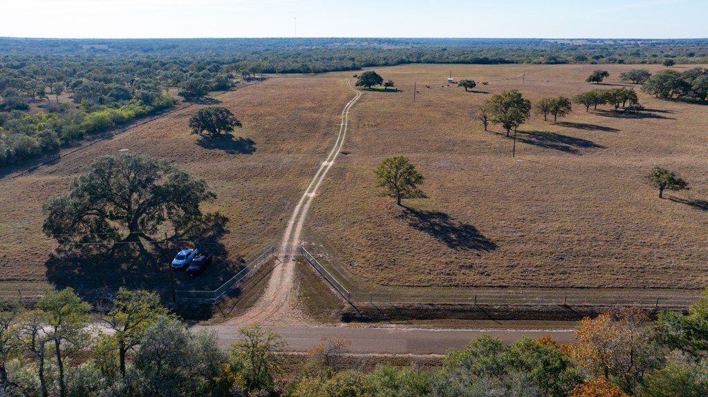 1038 Old Goliad Road Goliad, TX 77963 - Photo 3 of 32 an aerial view of a house with a yard