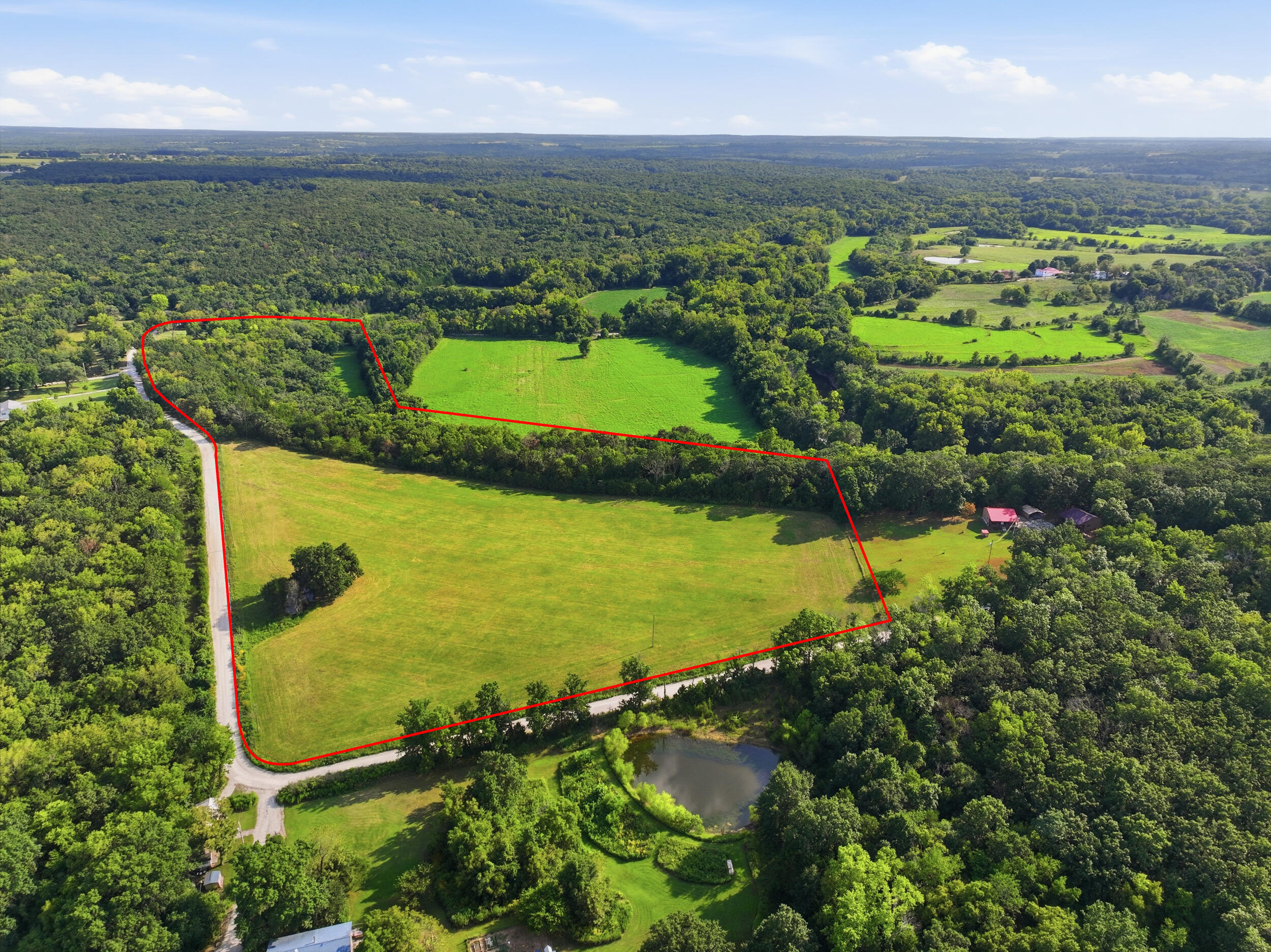3207 South 205th Road Half Way, MO 65663 - Photo 7 of 46 dji_20260806024553_0287_d-edit