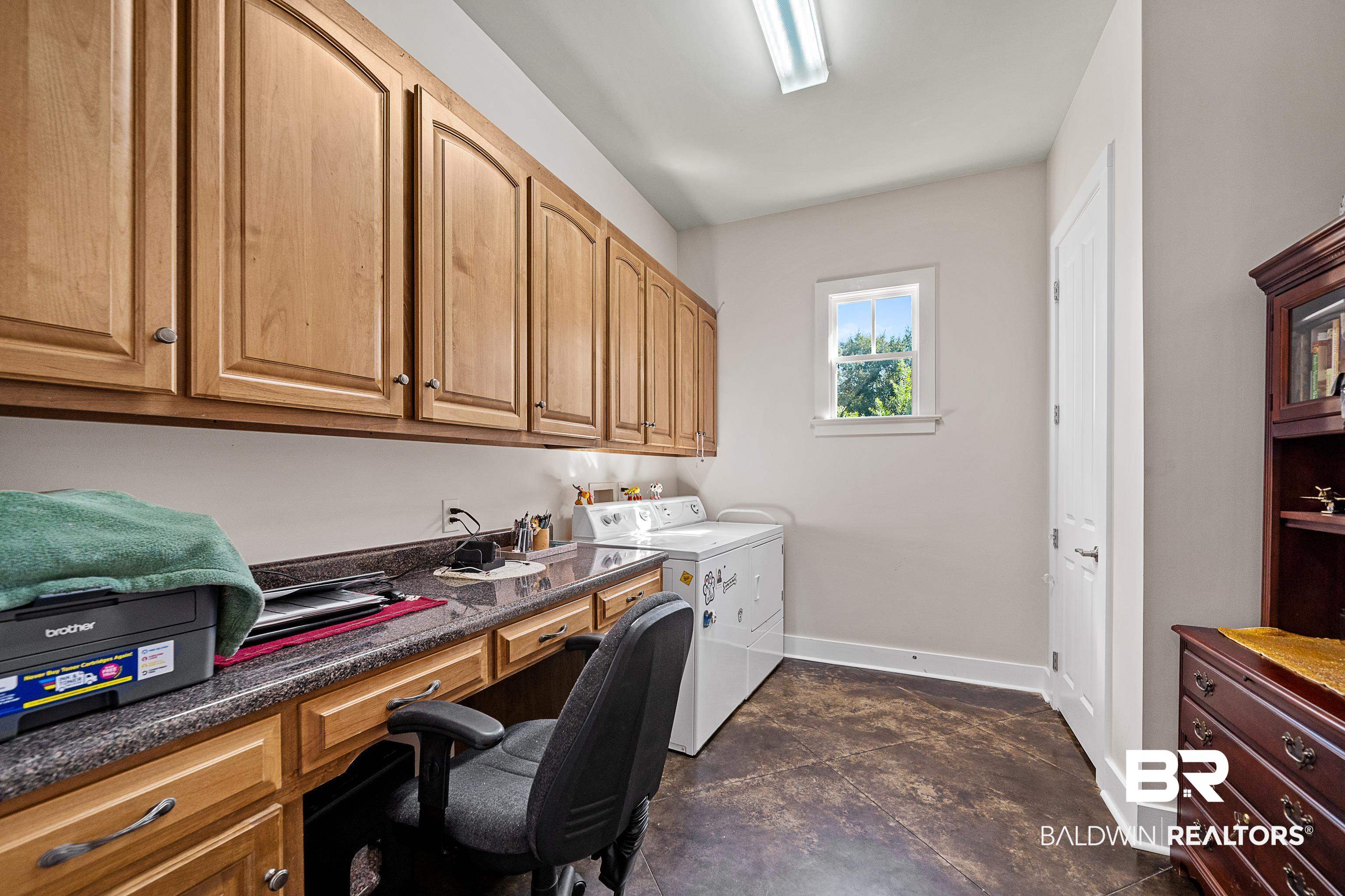 585 Falling Water Boulevard Fairhope, AL 36532 - Photo 37 of 67 Spacious Laundry Room with Desk Area