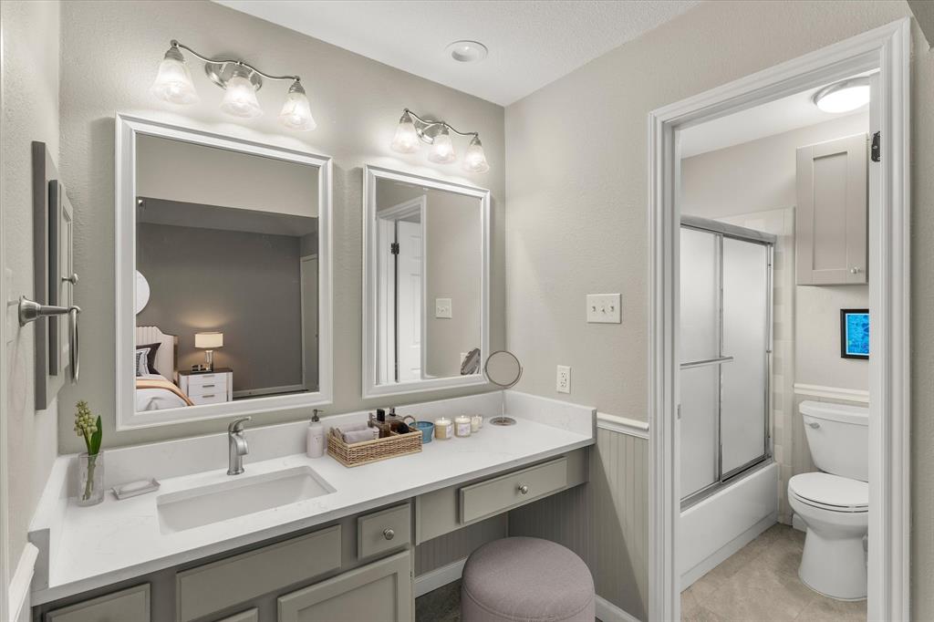 821 Baxter Drive Plano, TX 75025 - Photo 8 of 29 Primary Bathroom with separate shower area.