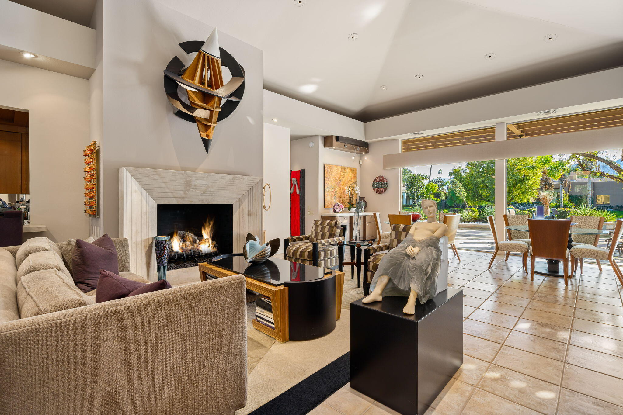 206 Crystal Bay Court Rancho Mirage, CA 92270 - Photo 17 of 62 a living room with furniture and a fireplace