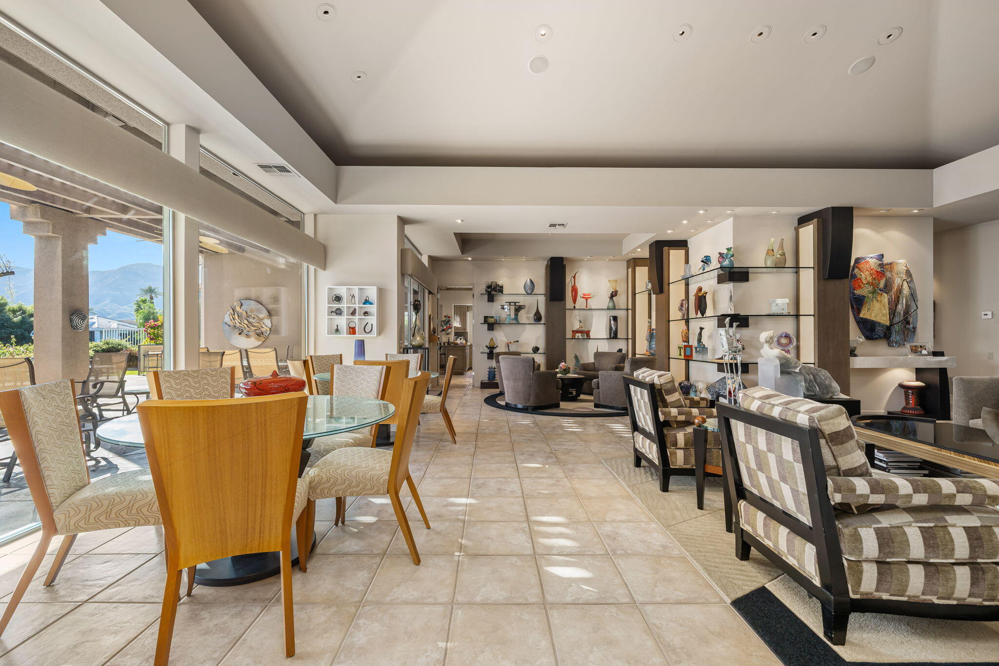 206 Crystal Bay Court Rancho Mirage, CA 92270 - Photo 21 of 62 a view of a dining room with furniture