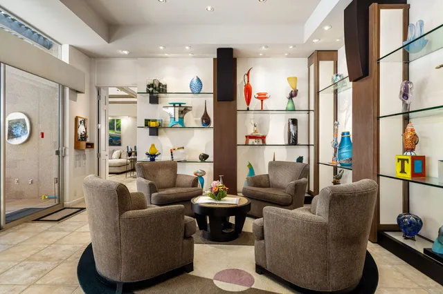 a view of swimming pool with outdoor seating