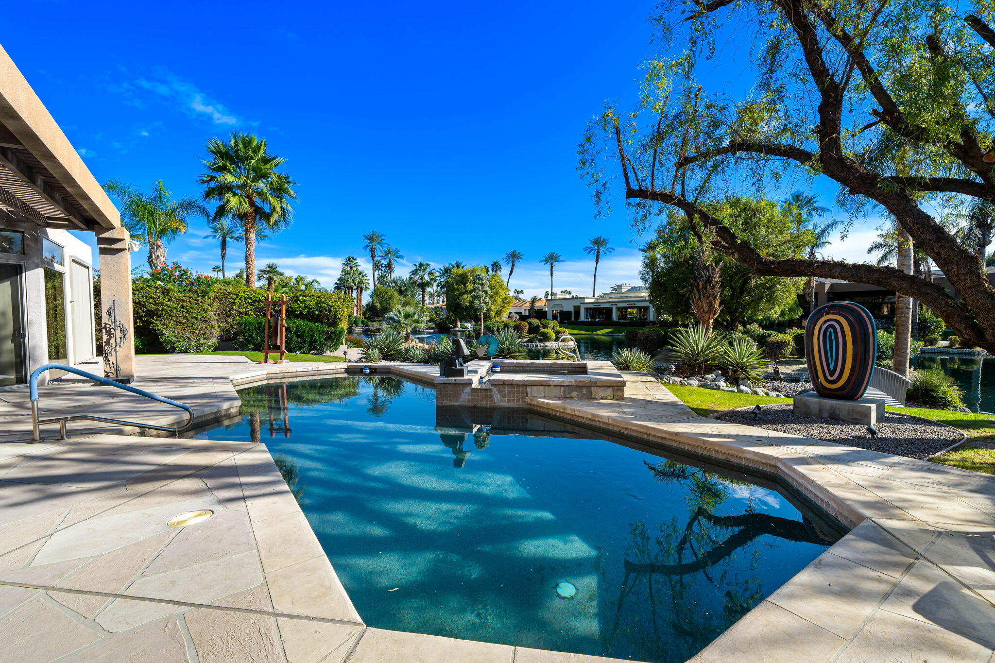 206 Crystal Bay Court Rancho Mirage, CA 92270 - Photo 33 of 62 a view of swimming pool with outdoor seating