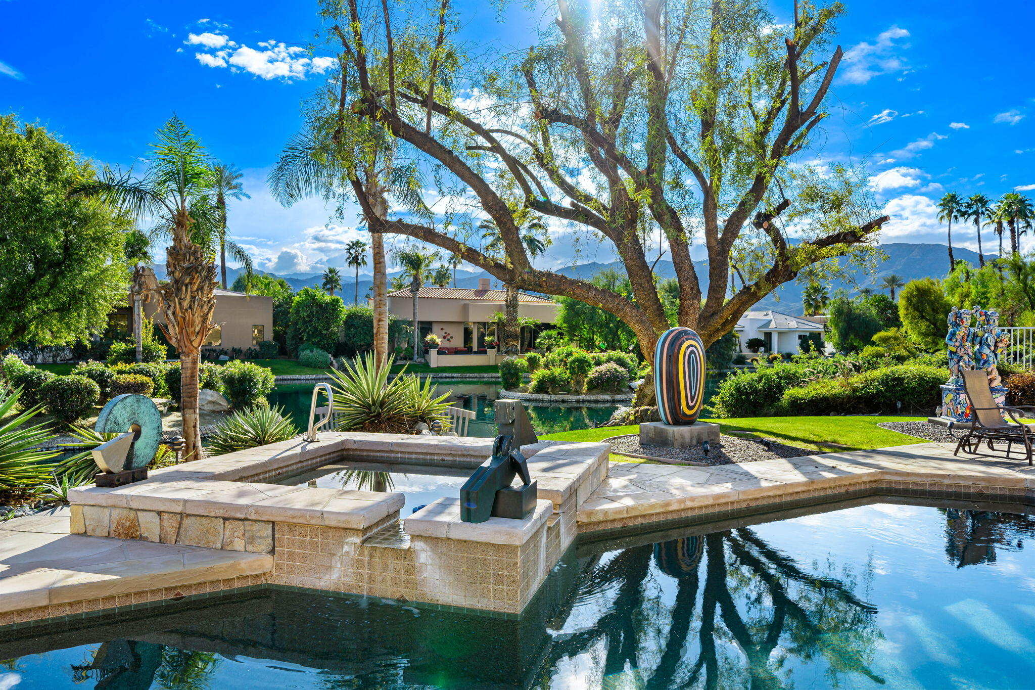 206 Crystal Bay Court Rancho Mirage, CA 92270 - Photo 35 of 62 a view of yard with patio and green space