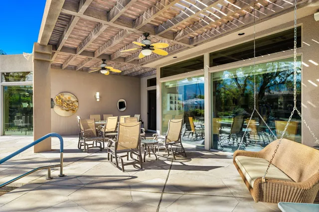a bathroom with double vanity sinks and a mirror