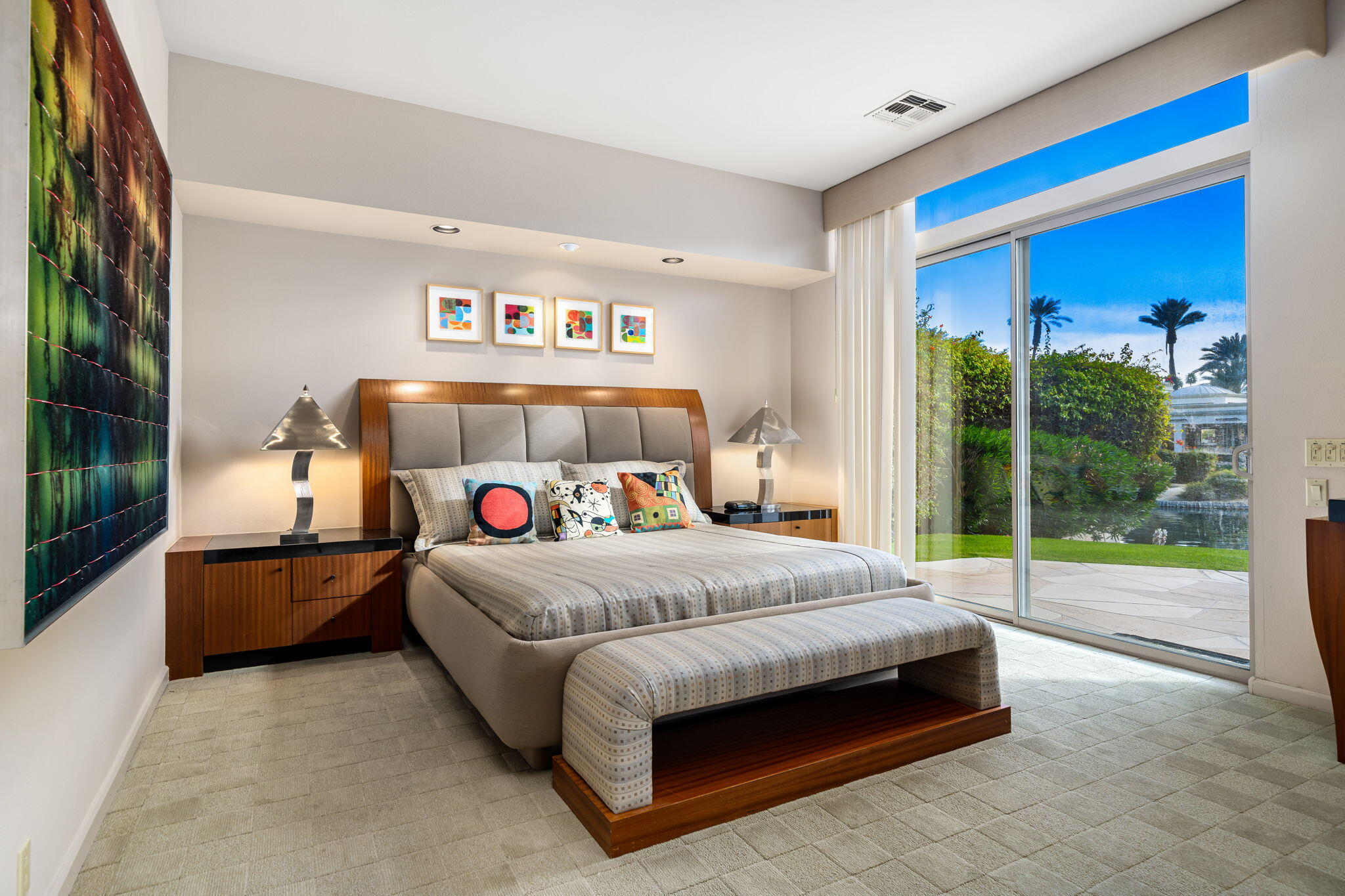 206 Crystal Bay Court Rancho Mirage, CA 92270 - Photo 44 of 62 a bed sitting in a room next to a window